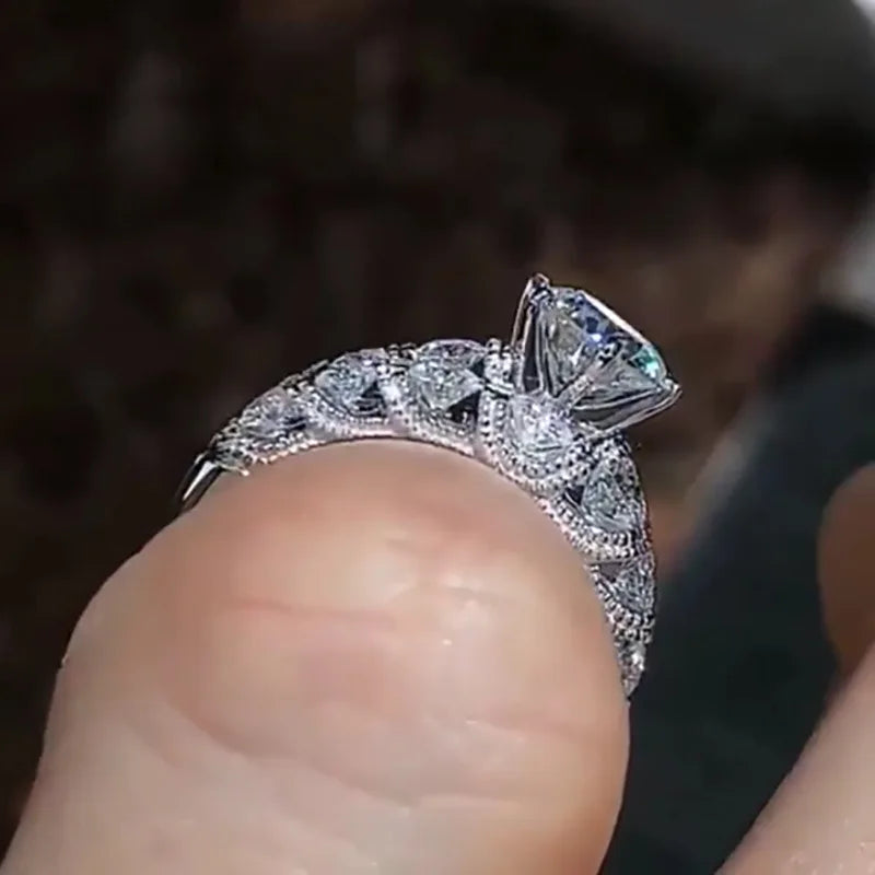 Elegant Round Brilliant Engagement Ring - White Gold D Color Diamond