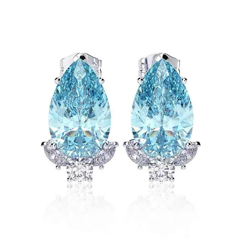 Water drop crystal earrings - light blue pear-shaped crystals in claw setting on 925 silver posts