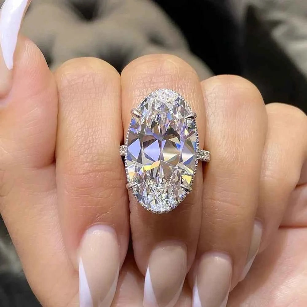Pear cut diamond engagement ring - 18K white gold halo setting with sparkling lab grown diamond