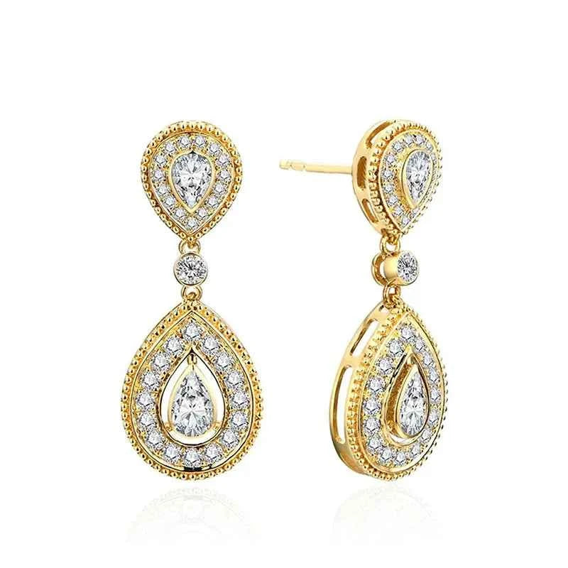 Pear cut diamond earrings - 18K solid gold with natural diamonds on white background