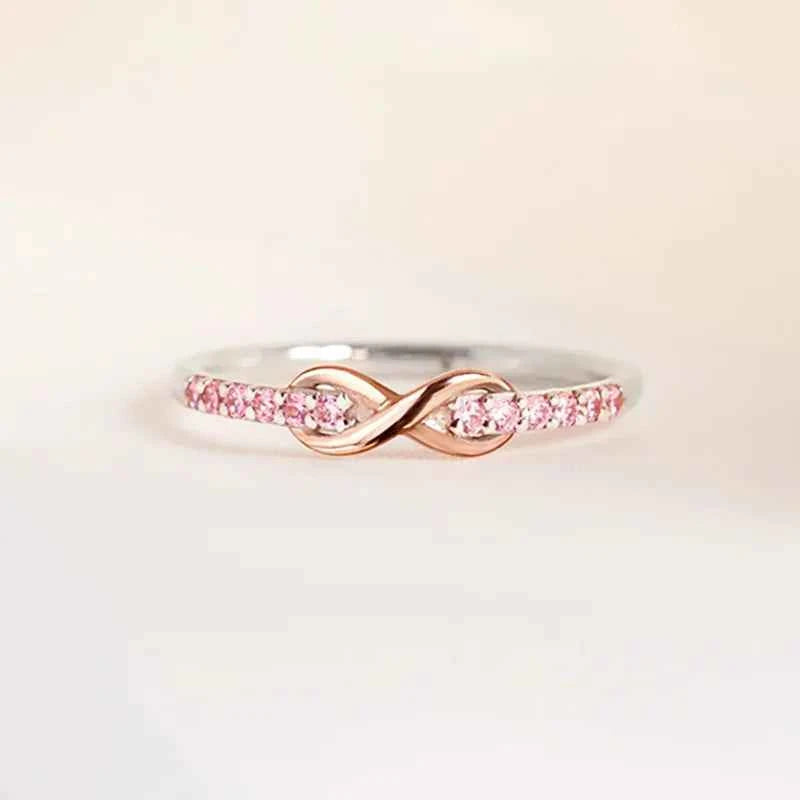 Q338 Infinity Moissanite Eternity Band Women's Engagement Ring Rose Gold Round Brilliant Cut Channel Setting