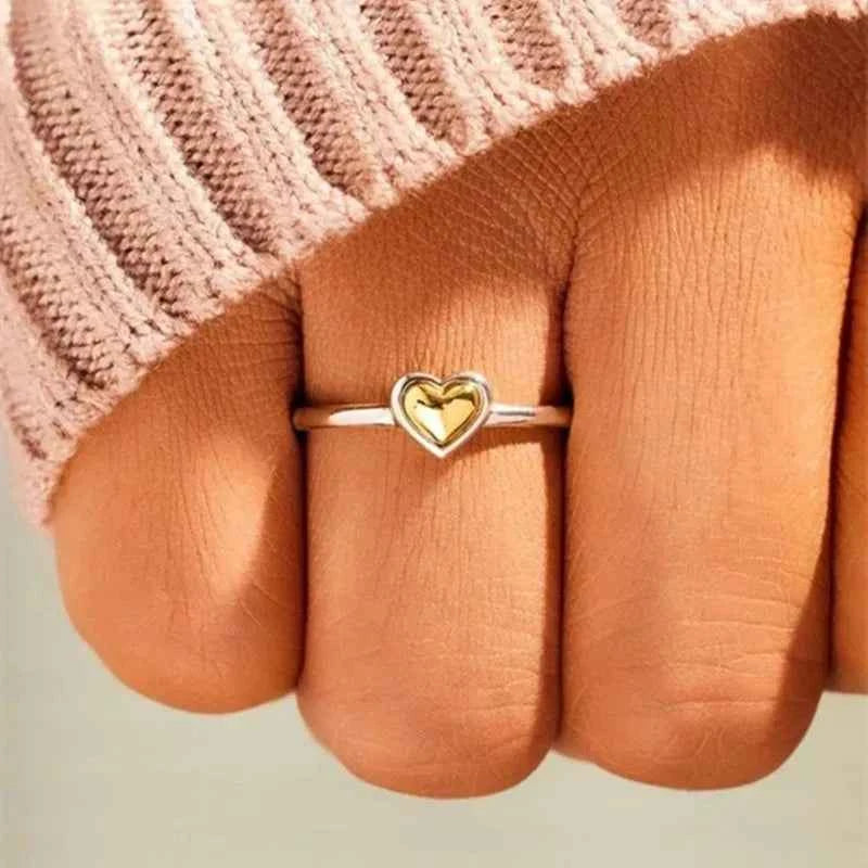 Gold plated heart ring – silver bezel setting with polished gold heart center
