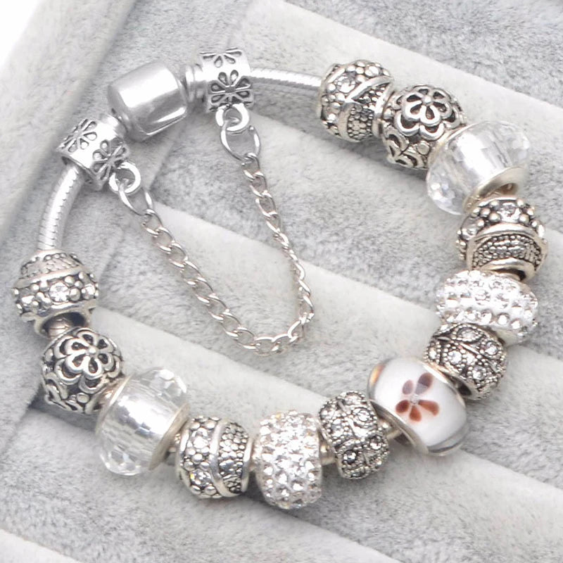 Elegant Crystal Flower Charm Bracelet - Gold Bead Design