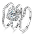 Bridal diamond ring set - 925 silver geometric claw setting with brilliant-cut diamond on white background