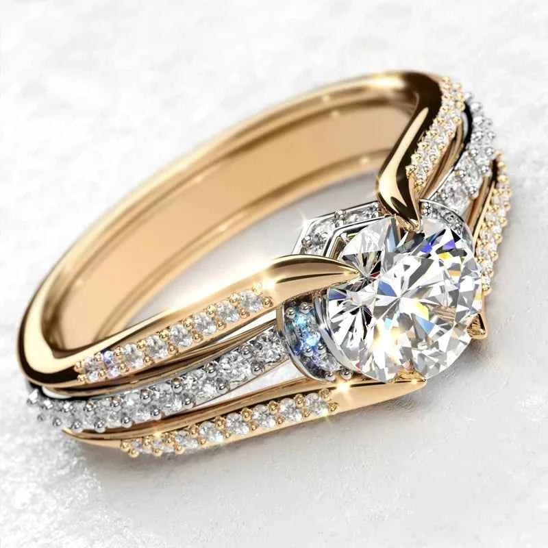 18k gold engagement ring - round brilliant cut diamond with side diamonds on dual-tone band