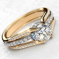 18k gold engagement ring - round brilliant cut diamond with side diamonds on dual-tone band