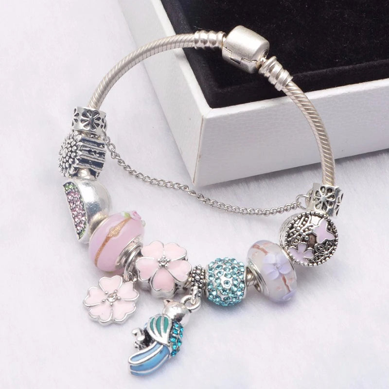 Elegant Crystal Flower Charm Bracelet - Gold Bead Design