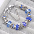 Elegant Crystal Flower Charm Bracelet - Gold Bead Design
