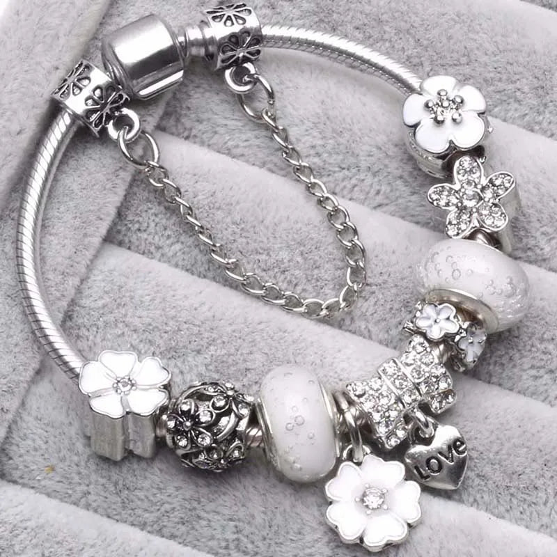 Elegant Crystal Flower Charm Bracelet - Gold Bead Design