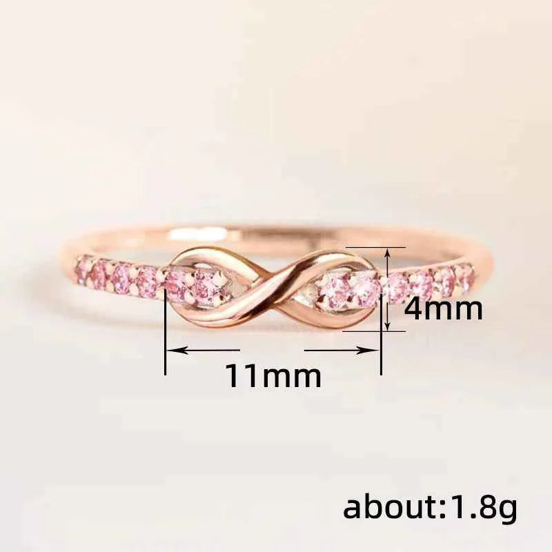 Q338 Infinity Moissanite Eternity Band Women's Engagement Ring Rose Gold Round Brilliant Cut Channel Setting
