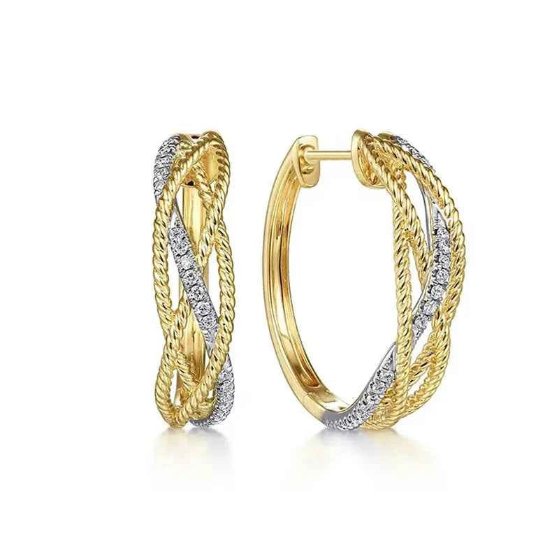 Two-tone diamond hoop earrings - gold and silver rope design with sparkling diamond inlay on women model