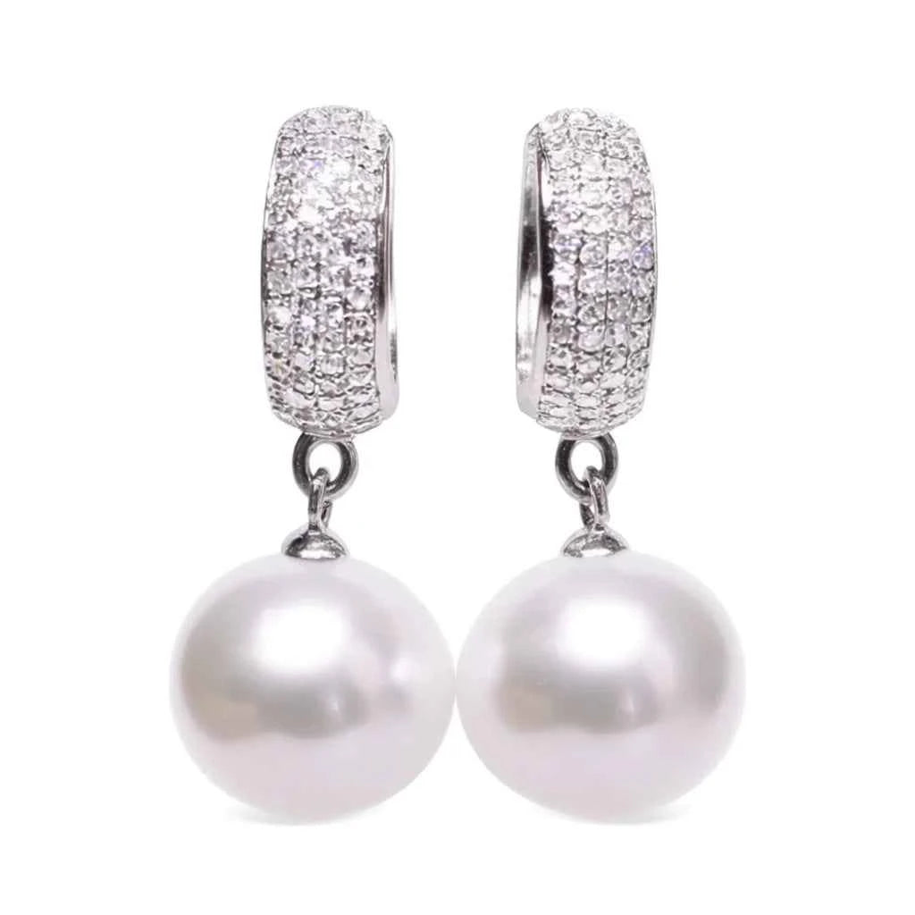 White gold pearl earrings - lustrous pearls with round brilliant diamond accents on 14k white gold huggie hoops