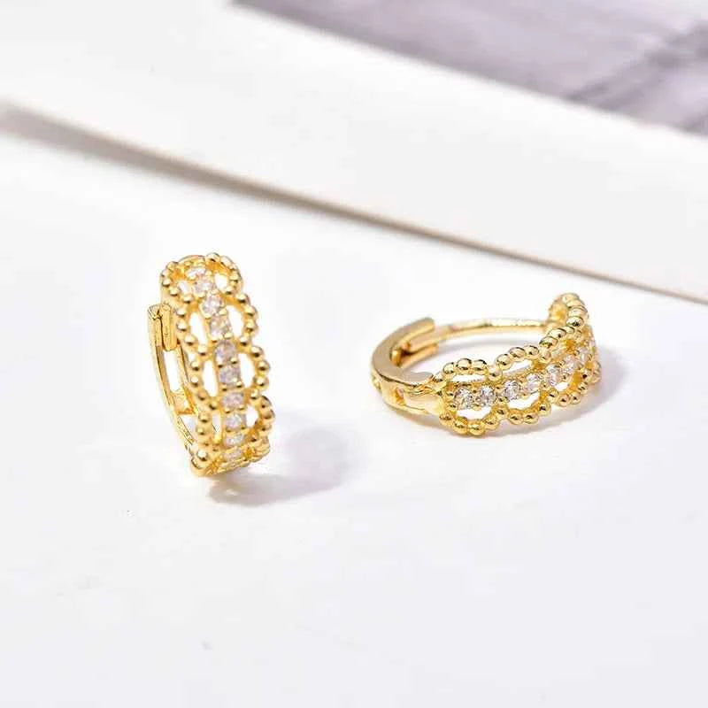 Crystal huggie earrings - golden geometric design with sparkling crystals on 18K gold plated zinc alloy