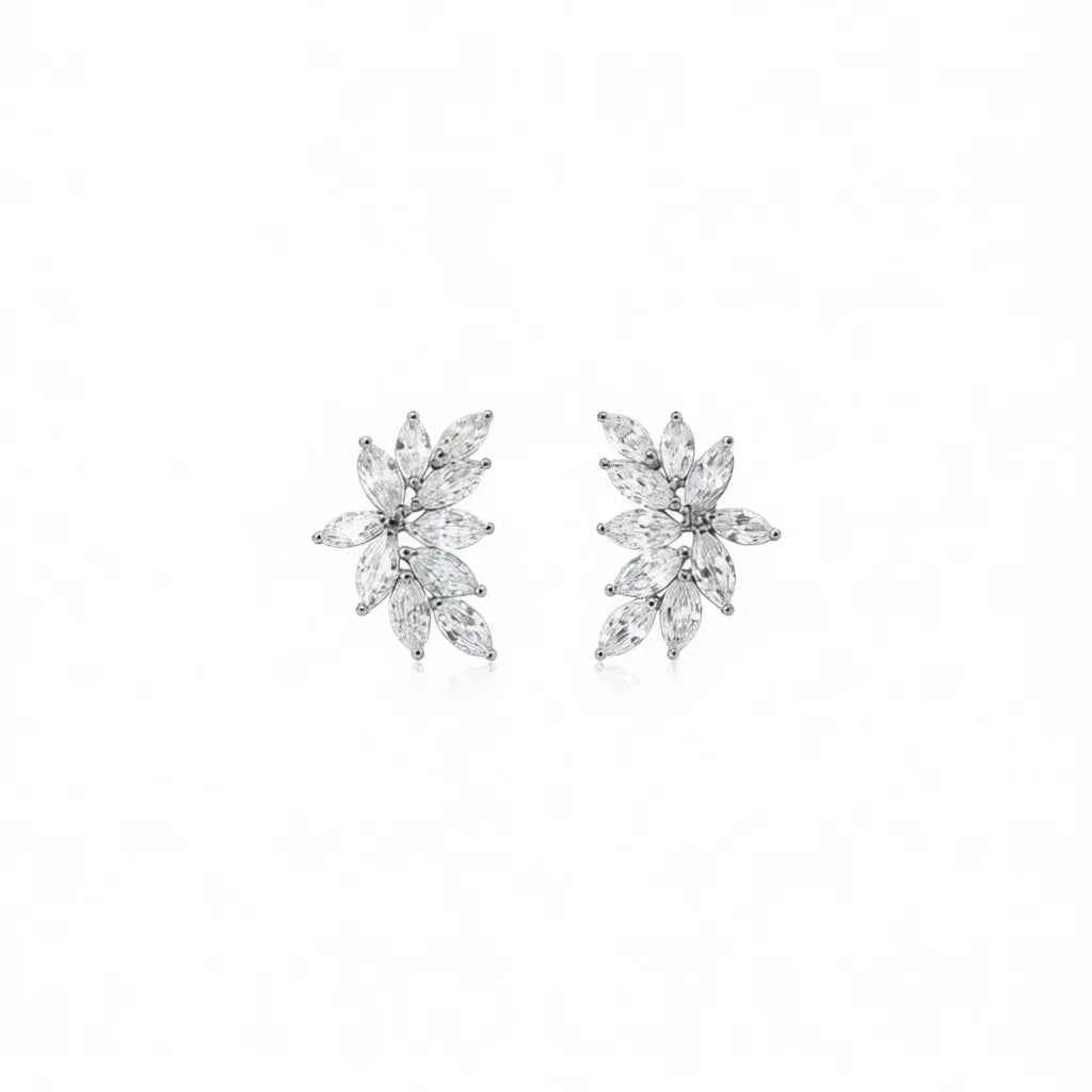 White gold flower stud earrings - crystal rhinestone claw setting on white background