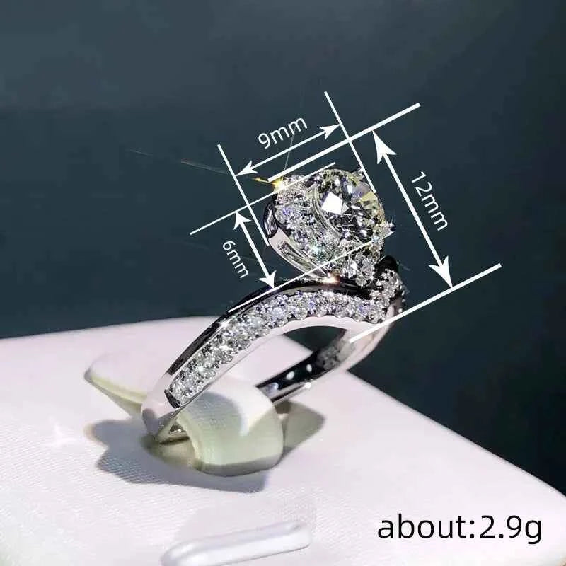 T0855 Women's White Gold Heart Cut Diamond Engagement Ring With Natural D Color Main Stone And Side Diamonds
