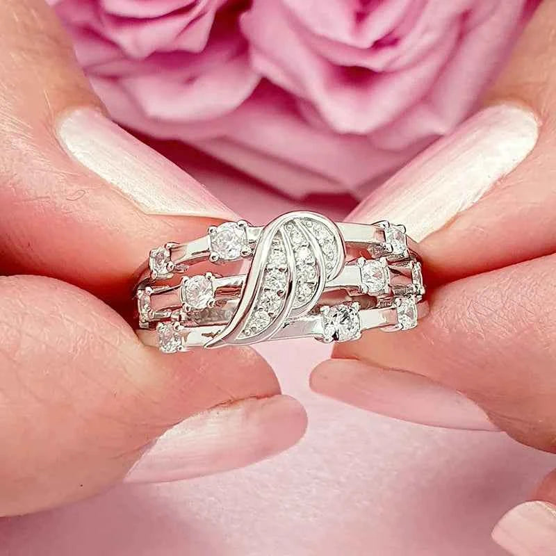 White gold diamond engagement ring - round brilliant natural diamond G color with stackable band on white background