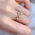 Cubic zirconia flower ring - gold-tone pave setting with round stone, elegant floral design