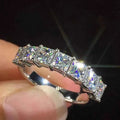 Princess cut engagement ring - natural D color diamond set in white gold band with sparkling brilliance