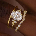 Oval cut diamond engagement ring - yellow gold with natural side diamonds D color