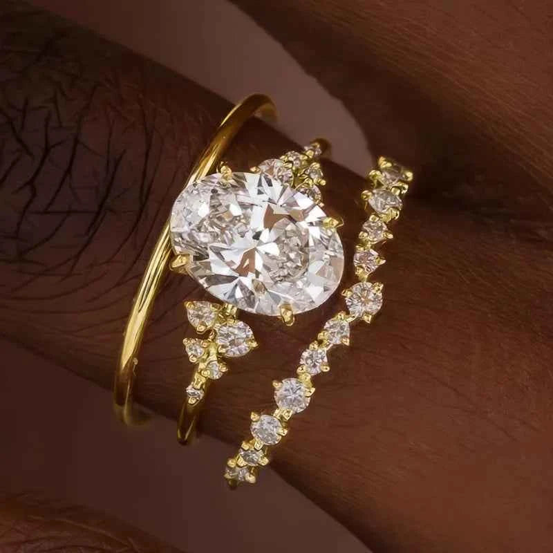 Oval cut diamond engagement ring - yellow gold with natural side diamonds D color