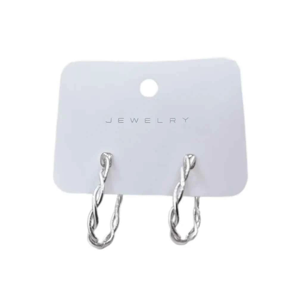 White gold hoop earrings - classic twisted hoop with polished finish on white background