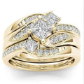 Bridal jewelry set - 18K gold princess cut diamond engagement ring with wedding band on white background