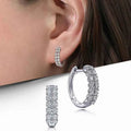 White gold hoop earrings - round brilliant cut crystal rhinestones in channel setting on white background