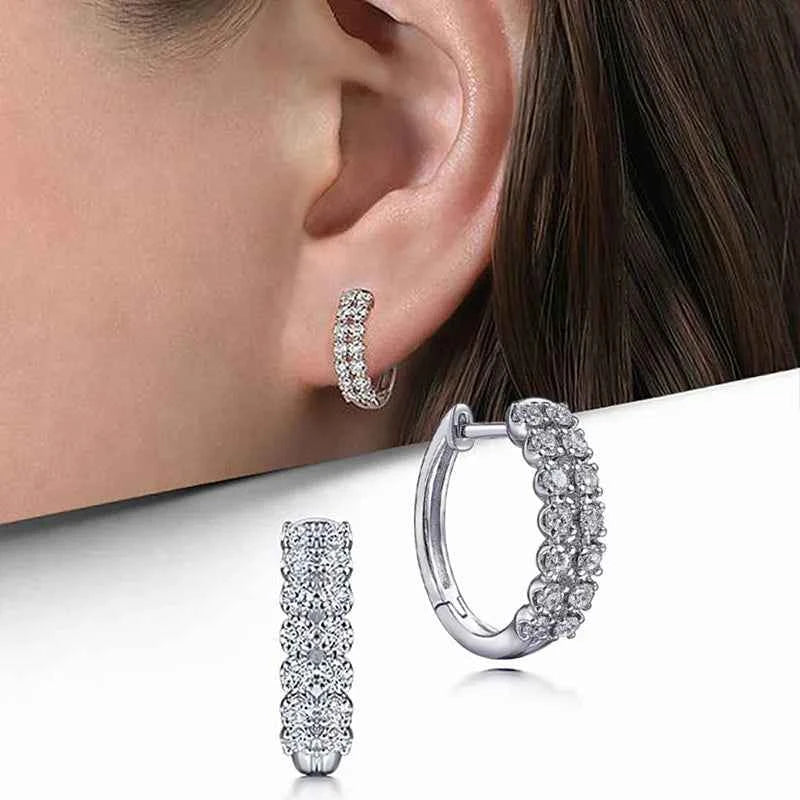 White gold hoop earrings - round brilliant cut crystal rhinestones in channel setting on white background
