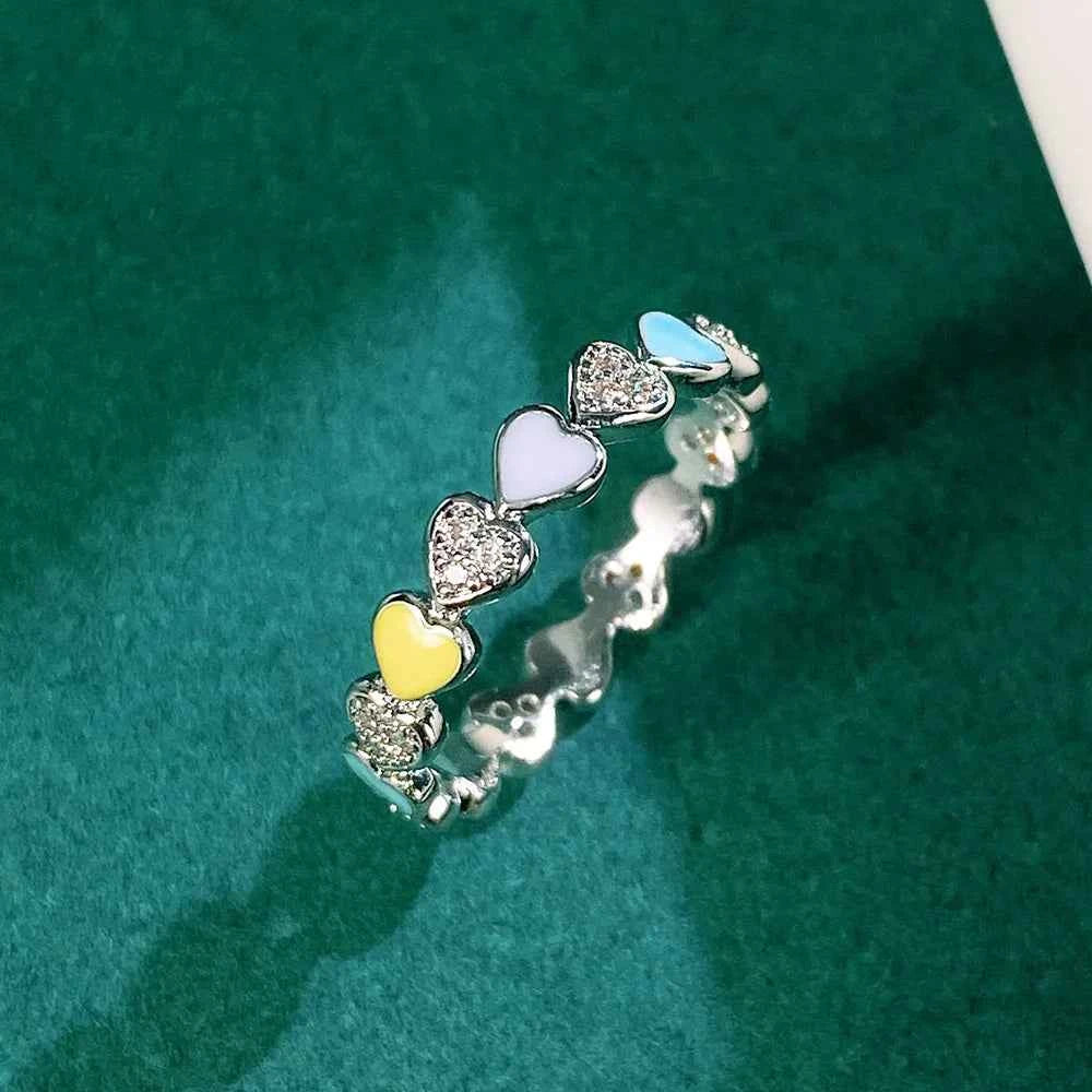 Heart eternity band ring - multicolor enamel hearts with pave zirconia on polished metal band