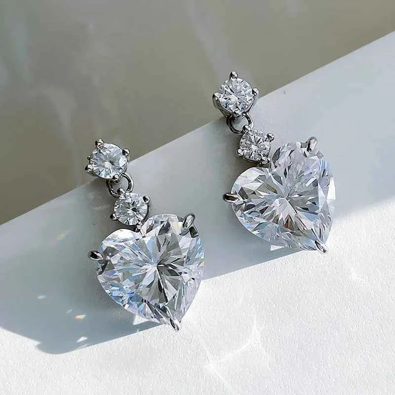 Gold heart drop earrings – heart-shaped crystal in claw setting on yellow gold plated silver