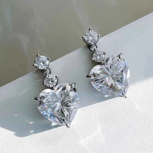 Gold heart drop earrings – heart-shaped crystal in claw setting on yellow gold plated silver