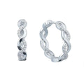 White gold hoop earrings - round diamond channel setting on classic hoop design