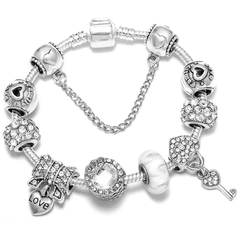 Elegant Crystal Flower Charm Bracelet - Gold Bead Design