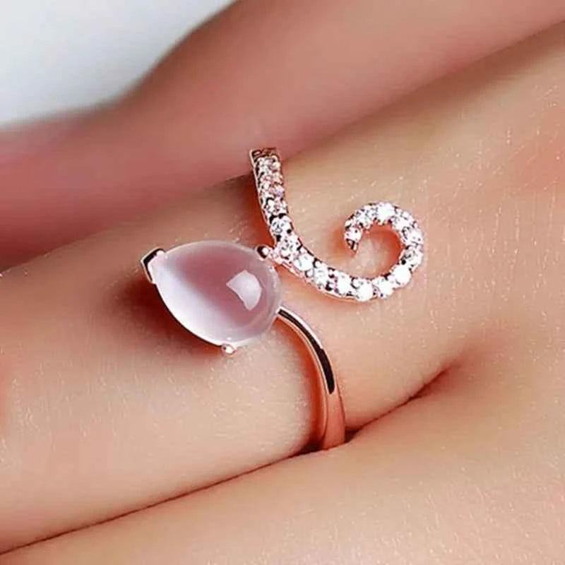 rose quartz engagement ring - water drop shape with pave setting in rose gold