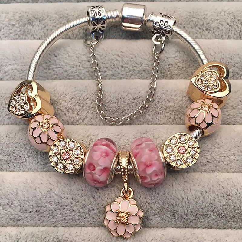 Crystal flower charm bracelet - gold beads with sparkling crystal flower charms on a snake chain