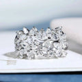 Marquise cut diamond ring - white gold with natural D color diamond and floral design on white background