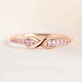 Moissanite eternity band - rose gold channel set ring with round brilliant cut stones