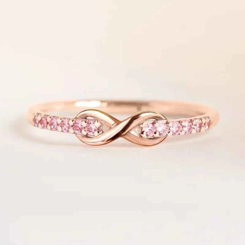 Moissanite eternity band - rose gold channel set ring with round brilliant cut stones
