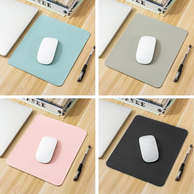 leather mouse pad - gray PU leather pad with rounded corners on a desk