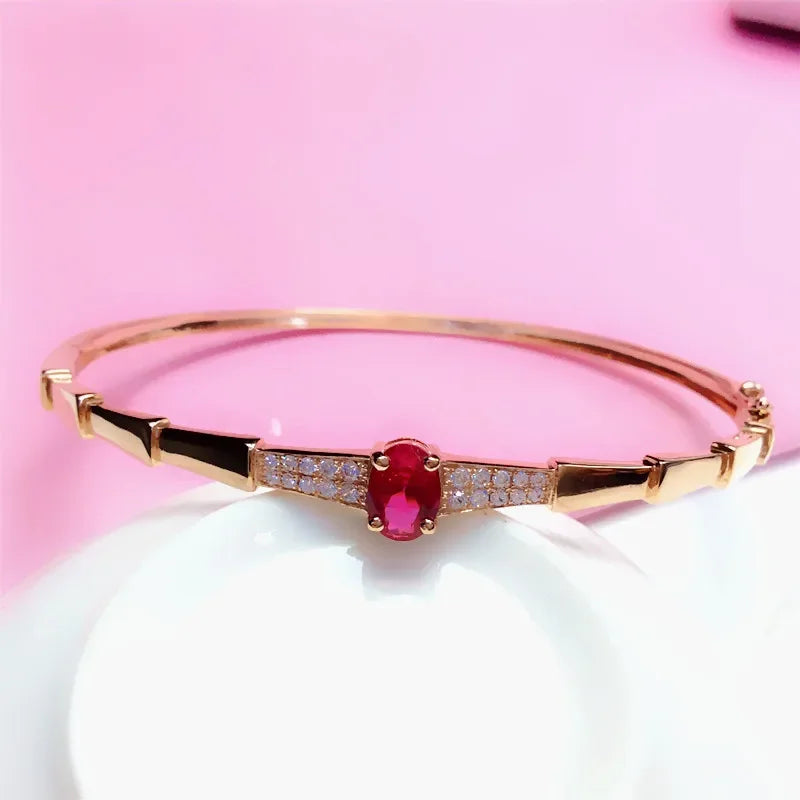 Ruby Cuff Bracelet - Elegant inlaid glossy design with cubic zirconia on a female wrist