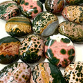 Ocean jasper palm stone - smooth polished stone with lustrous marbled ocean colors