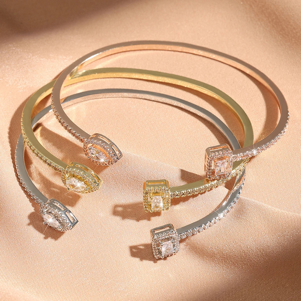 Gold cuff bangle - geometric design with cubic zirconia stones