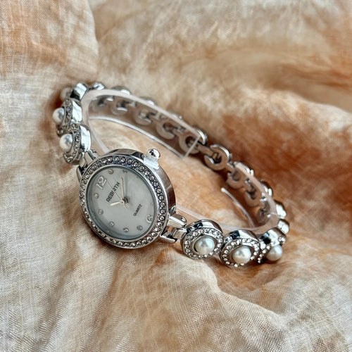 Pearl bracelet women's watch - elegant gold-toned with diamond quartz details