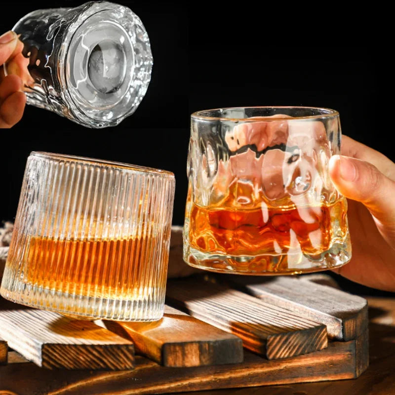 Rotatable whiskey glass - clear 200ml glass with novelty rotating design and wooden base