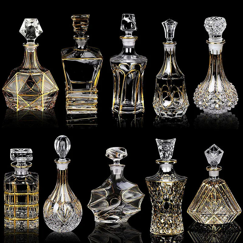 Crystal Wine Decanter - Elegant clear crystal glass decanter with a delicate gold line detail, showcasing red wine.