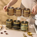 Luxury Spice Jar Rack - elegant metal rack with multiple pottery spice jars, sealed for freshness