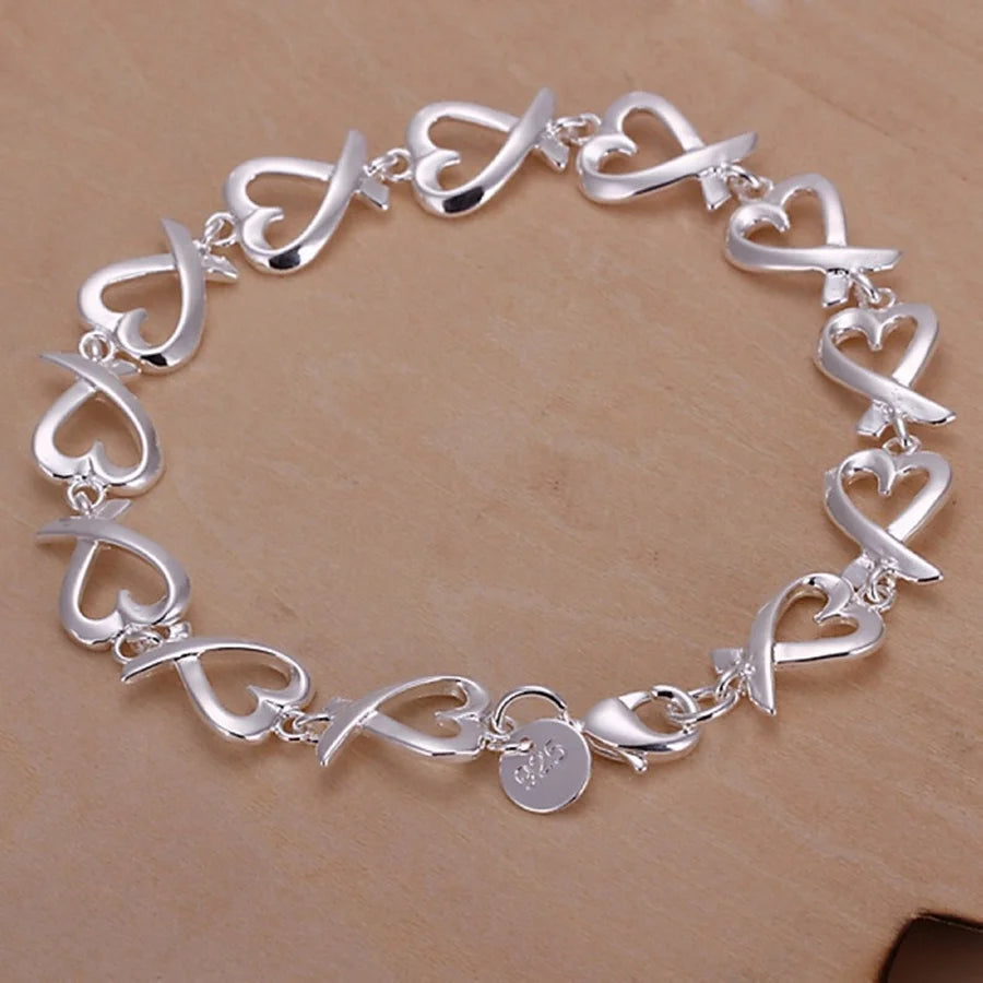 Sterling Silver Bracelet - delicate chain and link design, shining silver