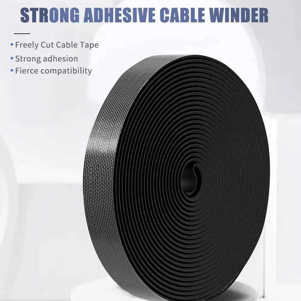 Tearable cable ties - black roll of reusable cord wraps for USB cables on white background