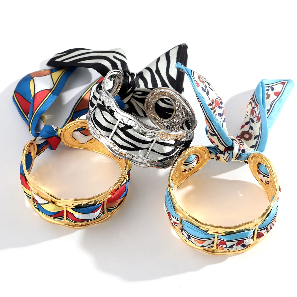 Silk Cuff Bracelet - Luxurious gold and silver open cuff with silk scarf detail