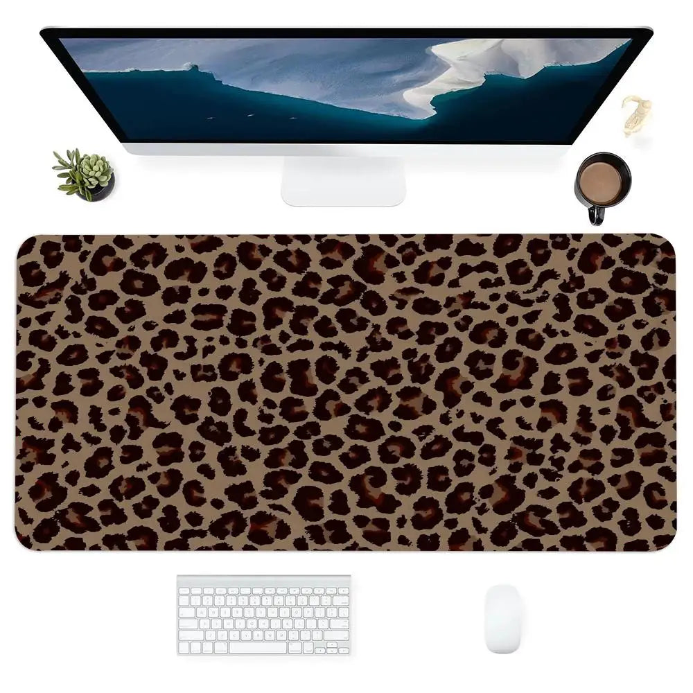 Leopard print mouse pad - extended non-slip gaming mat in a vibrant black and brown leopard pattern